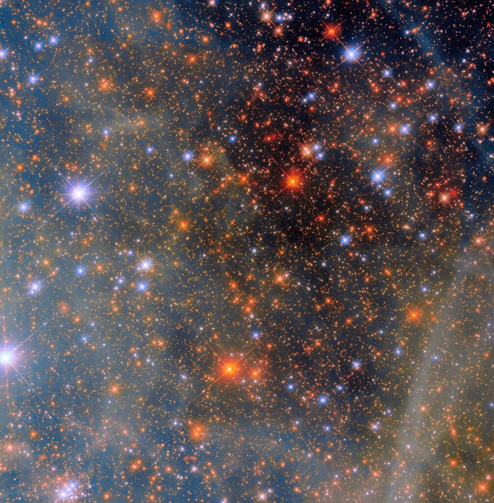 The Small Magellanic Cloud (SMC) is a dwarf irregular galaxy, one of the Milky Way’s closest cosmic companions, orbiting our galaxy alongside its larger sibling, the Large Magellanic Cloud