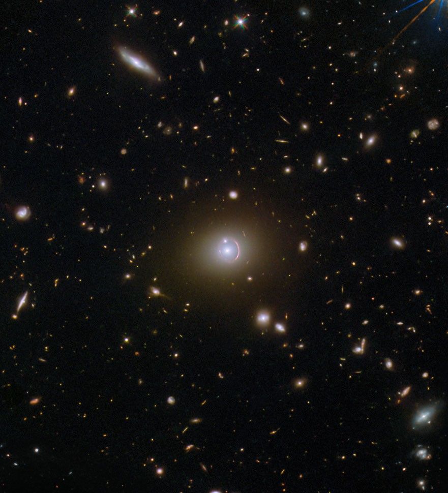 citizen scientist played a crucial role in identifying this stunning example of gravitational lensing underscores the democratizing power of modern science