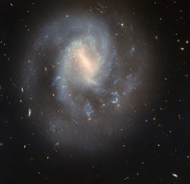 Explore how Hubble captured the IC 758 galaxy supernova and uncovered the stellar explosion of SN 1999bg. Discover its effects on star formation and galaxy evolution.